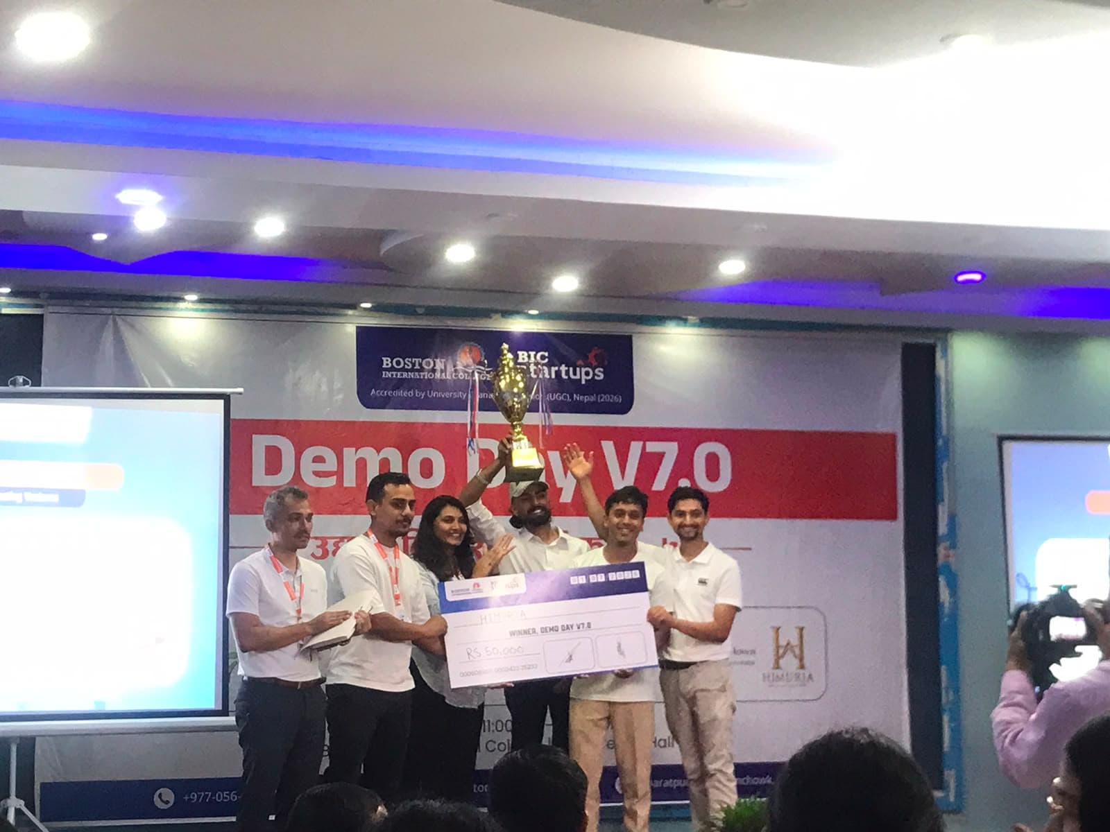 Himurja Skincare receiving Demo Day 7.0 recognition on stage